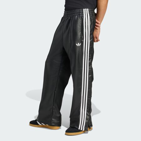 ADIDAS ORIGINALS Pantalon large en matière synthétique adidas x Jeremy Scott Black MIXTE