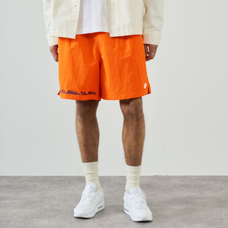 NIKE SHORT CLUB FLOW VARSITY ORANGE MEN