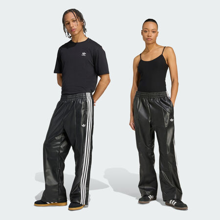 ADIDAS ORIGINALS Pantalon large en matière synthétique adidas x Jeremy Scott Black MIXTE
