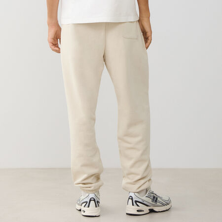 NEW BALANCE PANT JOGGER SMALL LOGO FT BEIGE/BLANC HOMME